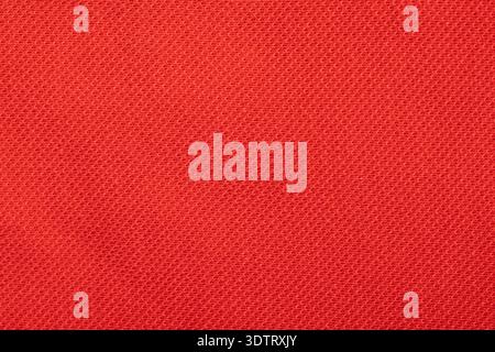 Red cotton fabric texture close up background Stock Photo