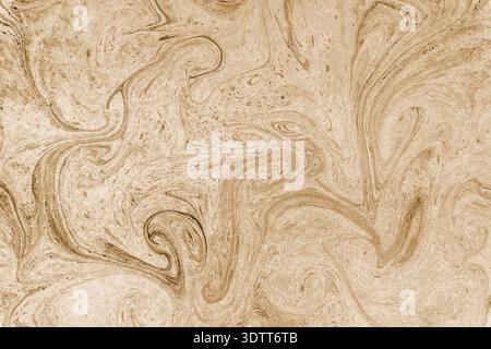 Abstract marble pattern creating a fluid background texture in shades of brown and beige Stock Photo