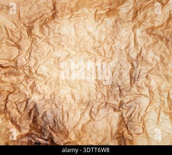 A burnt parchment paper background. Stock Photo