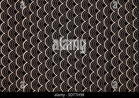 black and white geometric pattern with repeating curved shapes. Decorative seamless texture with rhythmic circular motif, ideal for background Stock Photo