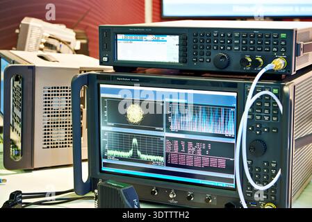 Spectrum analyzers and signal generator in laboratory Stock Photo