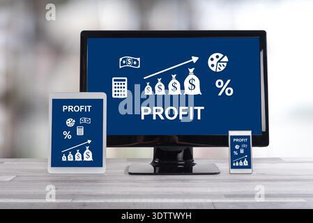 Profit concept shown on different information technology devices Stock Photo