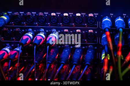 Professional Audio Stagebox with XLR Connectors and Cables in Studio Lighting Stock Photo