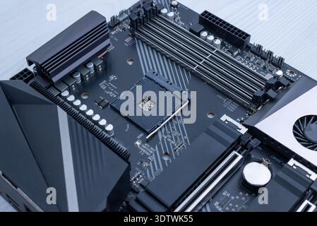 Close up of empty processor socket on desktop motherboard, computer hardware upgrade and pc building concept Stock Photo
