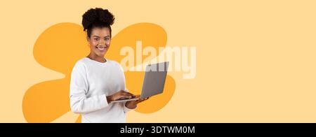 Collage of a Woman Smiling While Using a Laptop With a Colorful Background Stock Photo