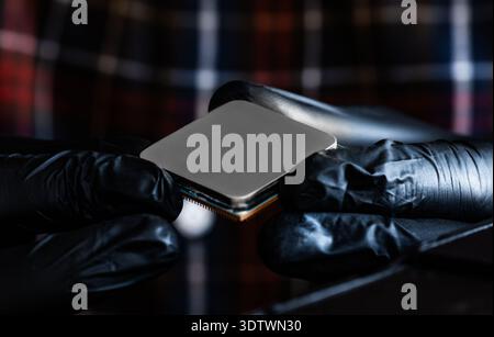 Close-Up View Of Computer Chip Technician Holding Stock Photo