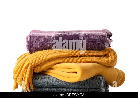 Stack of cozy blankets on white background, closeup Stock Photo