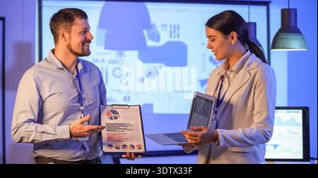 Young business analysts working in office Stock Photo
