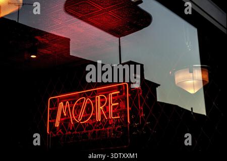 Oxford, England, UK. February 6th, 2020 More, Florescent sign for a local bar or cafe Stock Photo