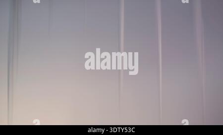 Soft pastel gradient background with vertical lines creating minimal abstract wall texture Stock Photo