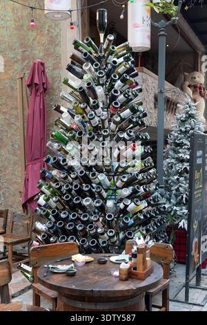 A tree made from wine bottles in a bar in Hanoi, Vietnam. Stock Photo