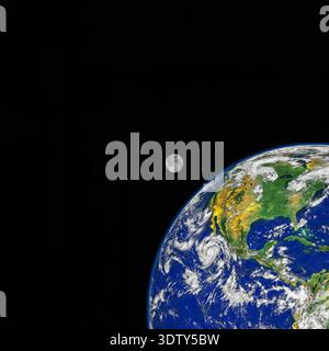 Earth from space view of North and South America with Moon and copy space. Stock Photo