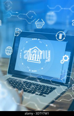 Banking invoice payment process shown on laptop screen with digital icons Stock Photo