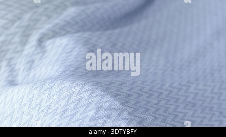 Detailed view of blue fabric featuring a zigzag pattern and soft, flowing folds Stock Photo