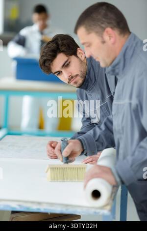 portrait of painter with apprentice Stock Photo