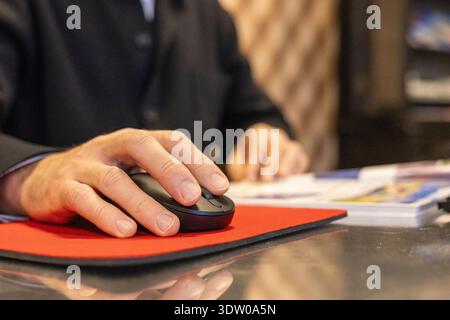Businessman Hand Using Computer Mouse At Office Desk Closeup Stock Photo