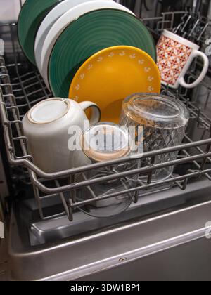 Modern open dishwasher with clean cups and glasses Stock Photo - Alamy