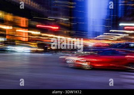 Night time in Chicago. Motion blur on the busy street. Stock Photo