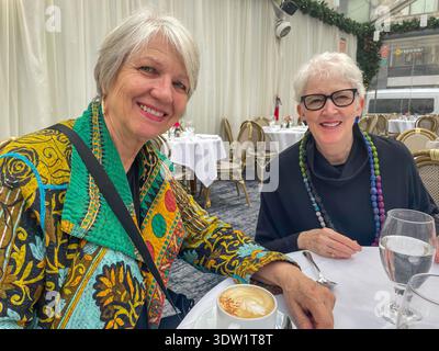 Two attractive senior women enjoying a leisurely lunch at Bryant Parton Grill on a cold winter afternoon, 2026, New York City, USA Stock Photo