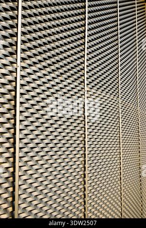 Close up of silver metallic wire screen surface providing a modern geometric background for industrial and construction design projects Stock Photo