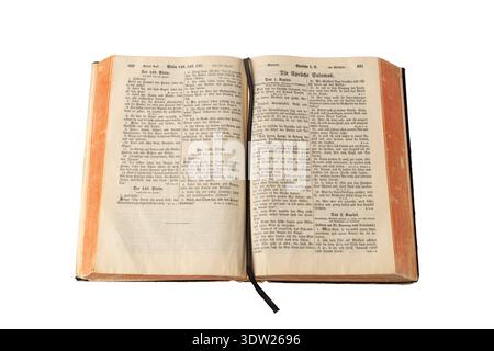 Open antique holy bible with German text in old print isolated on white background Stock Photo