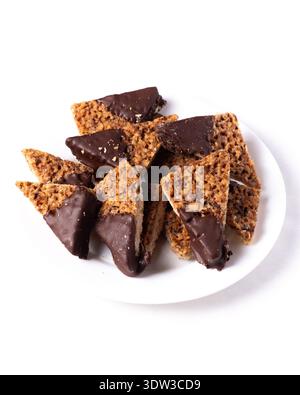Dining view walnut and coconut corners cookies dipped in white chocolate Stock Photo