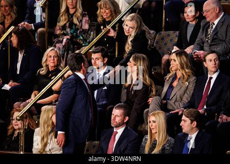 President Donald Trump greets Erika Kirk at a Turning Point USA event ...