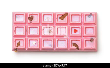 Top view of pink craft chocolate bar with almond isolated on white Stock Photo