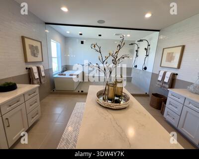Modern Bedroom with Symmetrical Design and Warm Lighting Stock Photo