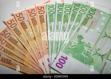 Arrangement of fifty and one hundred euro banknotes Stock Photo