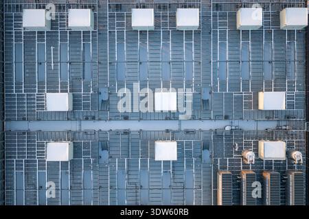Aerial view of a large data center rooftop, showing a complex array of hvac and server cooling systems, Warszawa, Poland. Stock Photo
