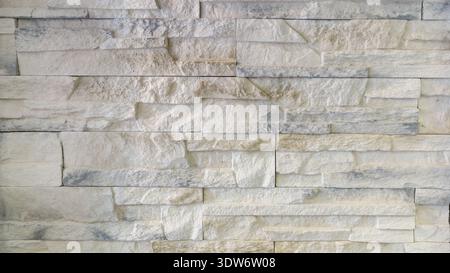 Light grunge stone wall as abstract background with copy space Stock Photo