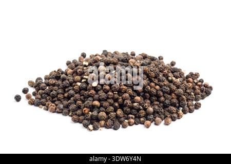 Black pepper corn pile, isolated on white background. Stock Photo