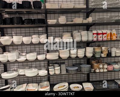 Pforzheim Germany Februar 25, 2026 Stacked White Ceramic Bowls And Plates Arranged On Matte Black Shelving, Clean Minimalist Tableware Stock Photo