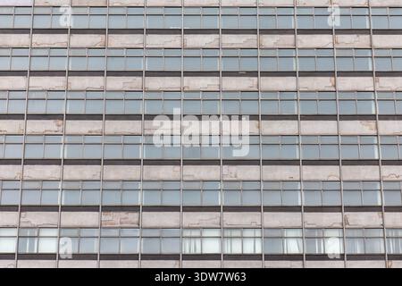 Deteriorating Building Facade Texture Ready for Demolition, Urban Decay Background" Stock Photo