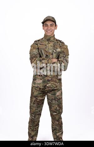 Soldier in camouflage uniform looking at camera in studio Stock Photo