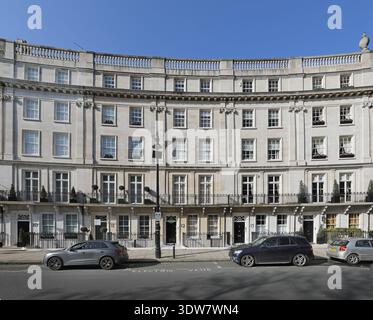 Wilton Crescent, Knightsbridge, London, UK. A curved terrace of Georgian houses in London's wealthy Belgravia district. Stock Photo