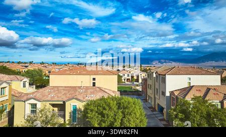 Aerial view of a modern residential neighborhood with rows of white ...
