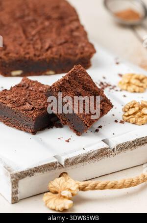 Homemade chocolate brownies with walnuts. Truffle pie. Delicious dessert close-up. Selective focus Stock Photo