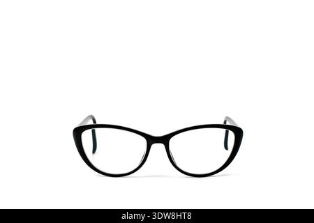 Pair of cate eye shape women's glasses with a black frame isolated on a white background. Copy space. Eyesight concept. Stock Photo