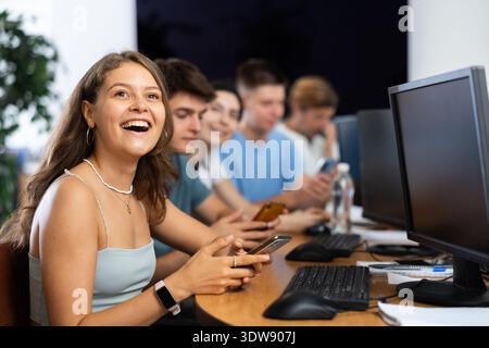 Student are engrossed in their mobile Stock Photo
