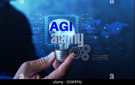 Hand holding light bulb with brain and AGI text on digital circuit background. Concept of artificial general intelligence, machine learning, global te Stock Photo
