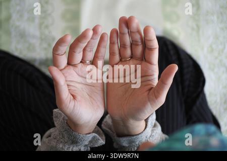 top view of muslim woman praying at home  Stock Photo