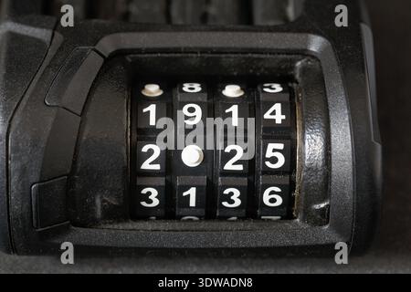 Black bicycle lock, combination lock, combination lock, number, year 2025, detail Stock Photo