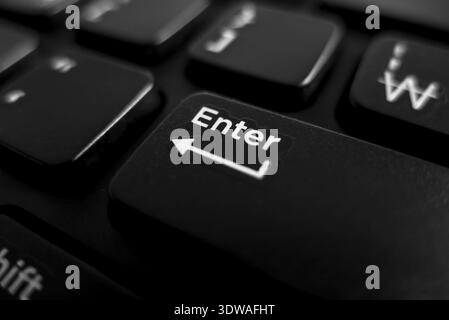 Keyboard close up focus in enter key Stock Photo
