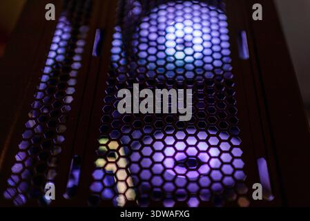 A part of rgb lights cooling illuminated fans powerful gaming computer at home with powerful fans and lights. Stock Photo