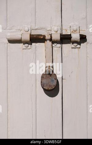 Padlock on a closed gate in Malta Stock Photo
