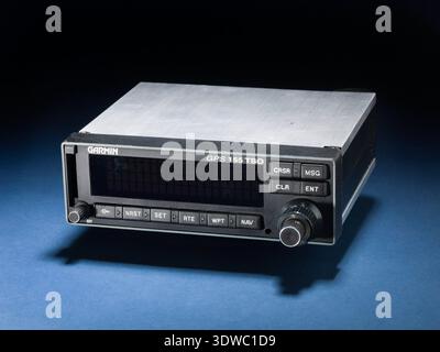 Garmin GPS 155 Prototype was a 1994 aircraft global positioning system receiver featuring an aluminum chassis, digital display, integrated circuit boards, rechargeable battery, and external connectors for avionics integration. The archival photograph records the control interface, display unit, and electronic navigation hardware used in early satellite based aircraft navigation. Stock Photo