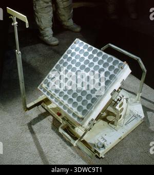Laser Ranging Retro-Reflector, Apollo is a scientific instrument designed to return incident laser beams along a parallel path, enabling precise measurement of the Earth–Moon distance. Units were deployed on the lunar surface during the Apollo program, and a training unit was donated to a museum by The Bendix Corporation in 1972. The archival image records this historical photographic print of a spaceflight experiment device. Stock Photo