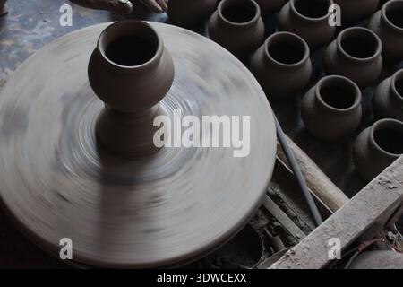 Traditional terracotta clay pots in a pottery market in Delhi, India, showcasing handcrafted textures and decorative patterns (Delhi, 2019). Stock Photo